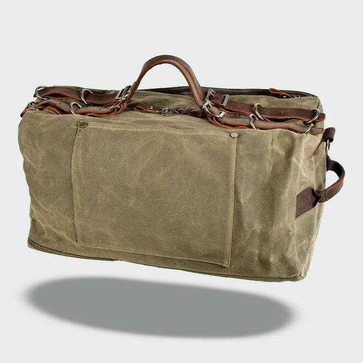 Rymlig herrduffelväska i canvas med läder, militärstil, perfekt som robust resväska.