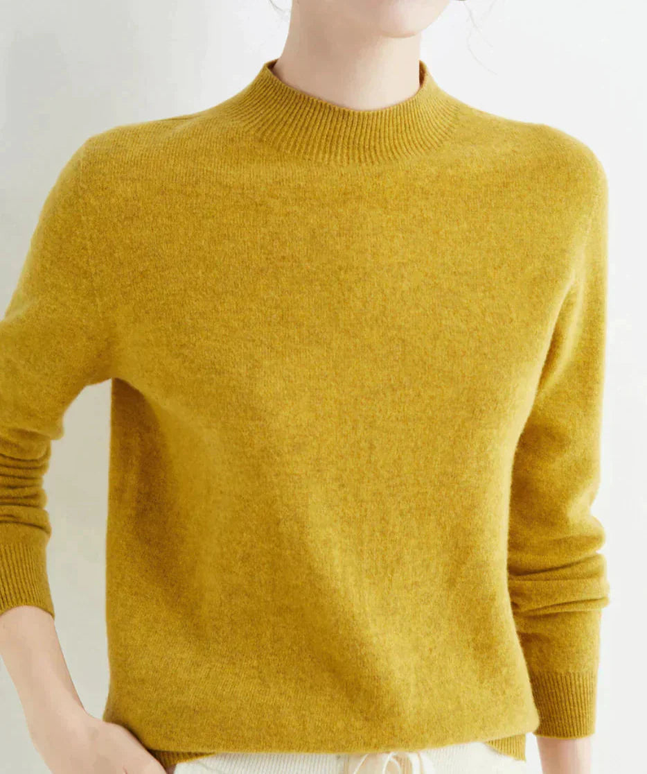 Kashmirtröja för dam med rund hals, elegant och bekväm för alla tillfällen.