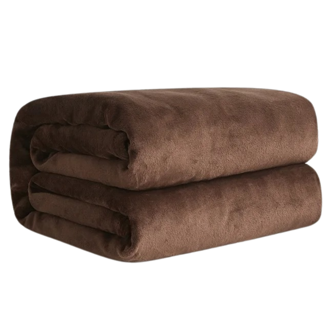 Stapel med mjuka, multifärgade korallfleece filtar för heminredning.