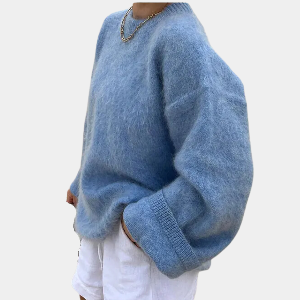 Trendig, långärmad damtröja i oversized modell. Mångsidig för höst- & vinterkläder, stilren och bekväm.