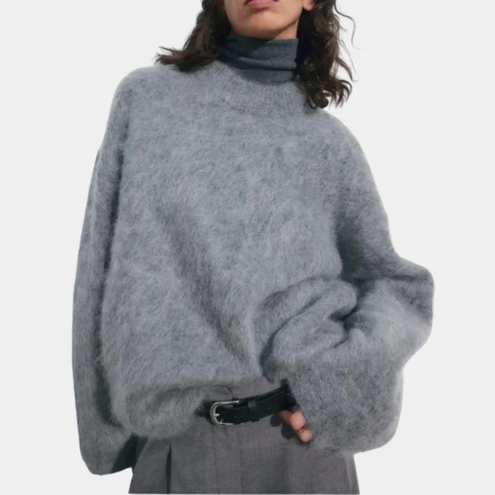 Avslappnad och stilren oversized damtröja med långa ärmar. Essentiell för höstmode som erbjuder maximal komfort.
