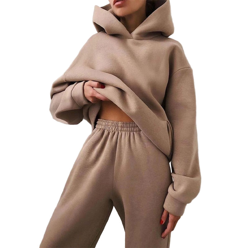 Mjukt jogging set för damer med stilfull hoodie och bekväma byxor, perfekt för fritid och avkoppling.