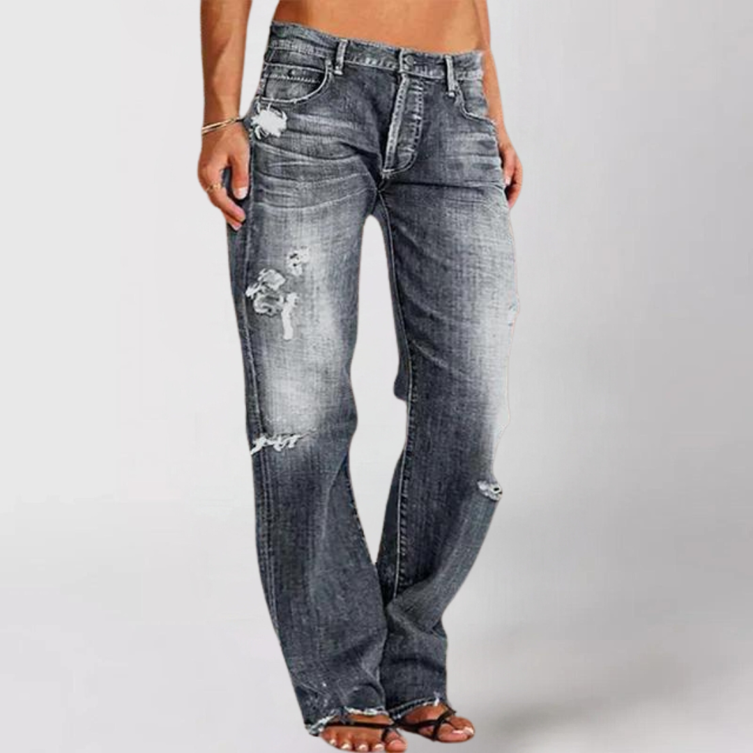 Svarta modedenimjeans för kvinnor, med utsvängd ben och låg midja styling, full längd.