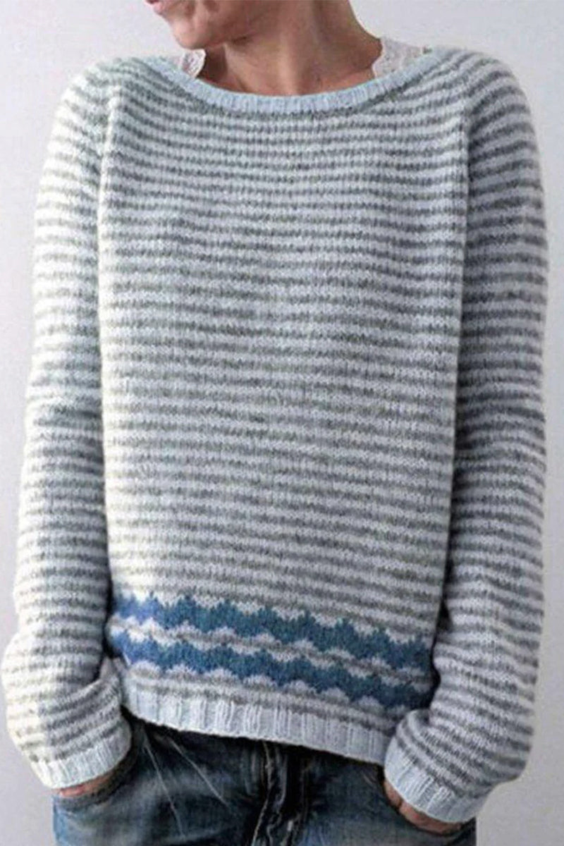 Stilren damtröja med färgblockerad design, rund hals. Avslappnad passform för vårmode, höstmode och komfort.