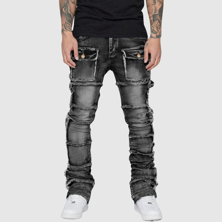 Blå distressed herrjeans med modern passform. Stilrena slimfit jeans för vardag och fest.