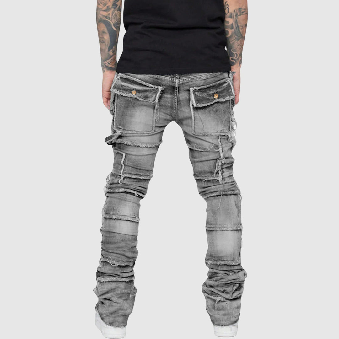 Grå distressed herrjeans i modern stil. Vardagsjeans för män, stilrena och bekväma.
