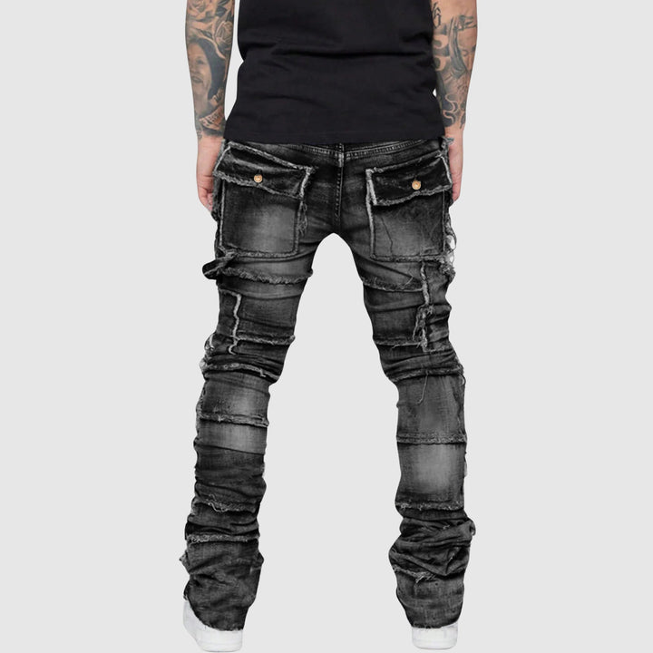 Slimfit distressed herrjeans, bekväm passform. Trendiga modejeans för män med modern stil.