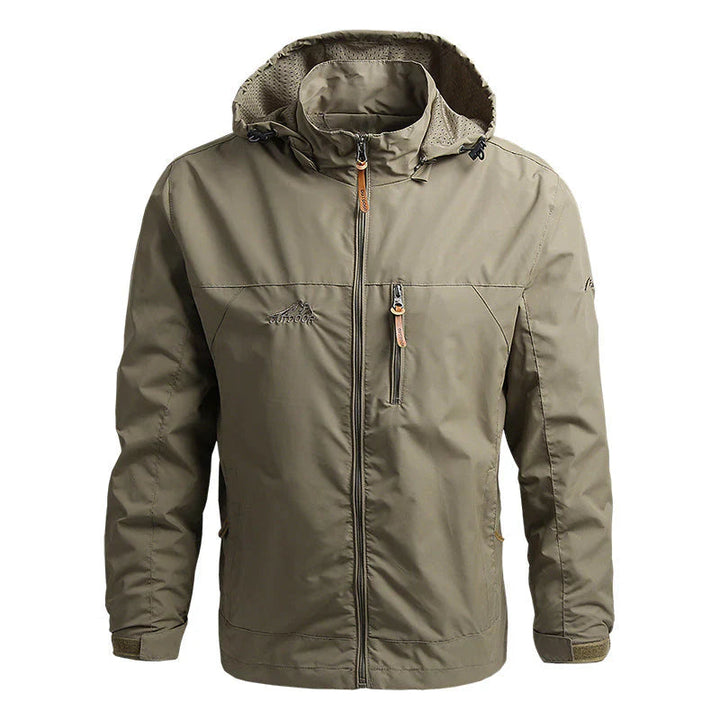 Herrjacka som skyddar mot vind och lätt regn. Vindavvisande, vattenavvisande softshell för alla äventyr.