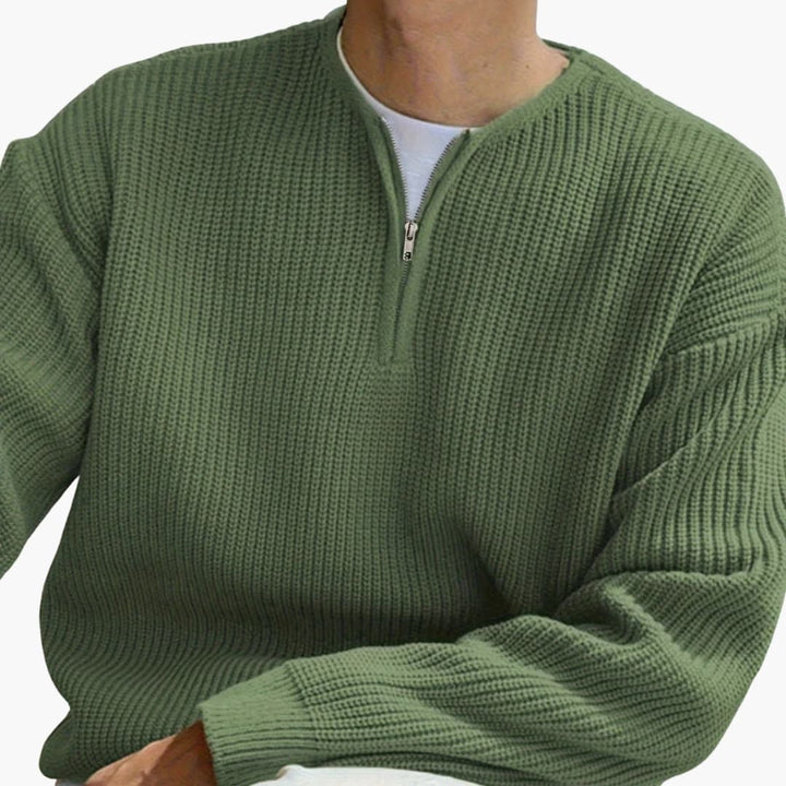 Grön herrtröja med halvzip, perfekt för höstens och vinterns herrmode. Långärmad och modern design.