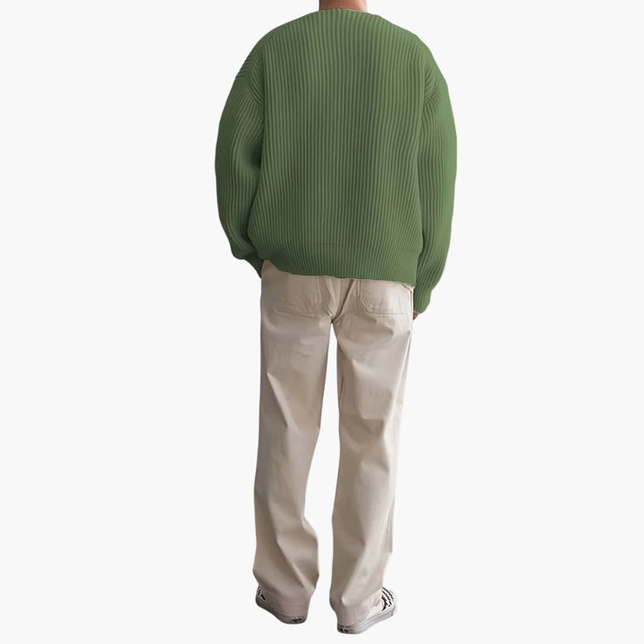 Svart herrtröja med halvzip i modern stil. En långärmad tröja som erbjuder komfort och elegans för herrmode.