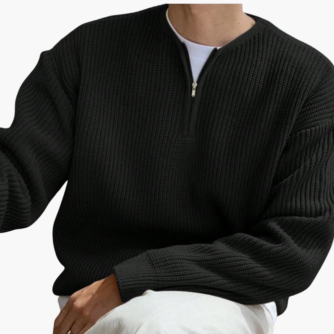 Svart, långärmad herrtröja med halvzip. Perfekt för vardagsmode, modern stil och bekväma höst/vinterdagar.