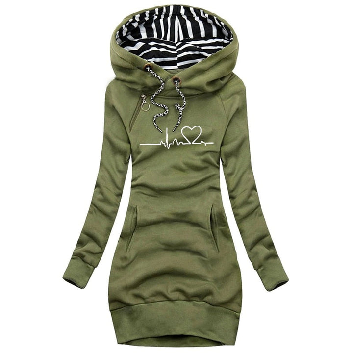 Mjuk stickad damtröja med avslappnad passform. Modern pullover för bekväma kvinnokläder under vintern.