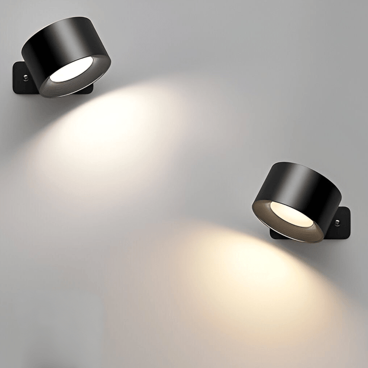 Uppladdningsbar trådlös vägglampa EasyStick. Enkel laddning för långvarig LED-belysning i modern design.
