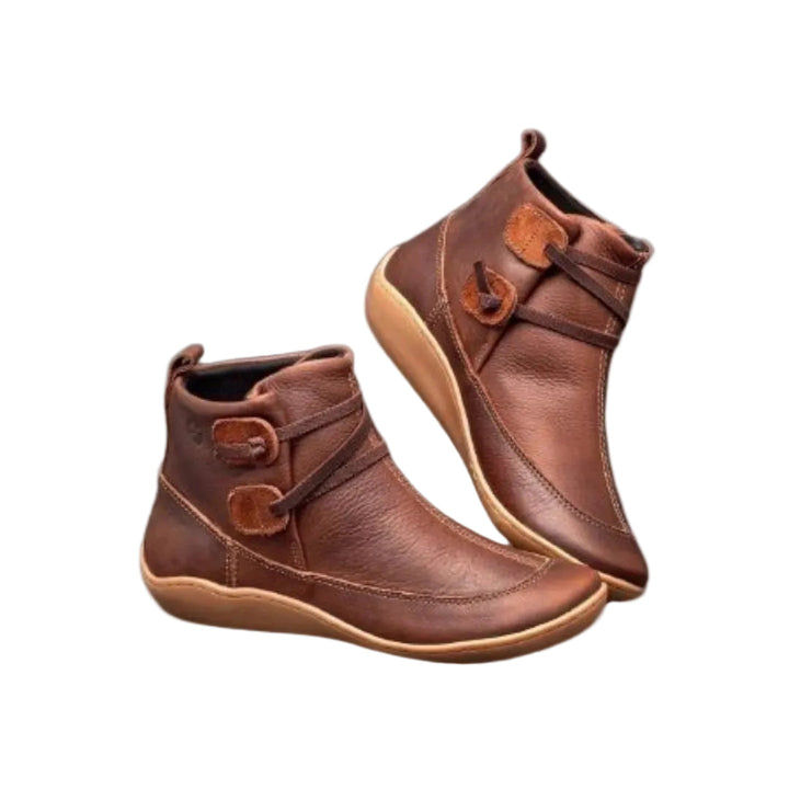 Moderna ankelboots för dam med stilren remdetalj och bekväm passform. Perfekt för vår och vardag.