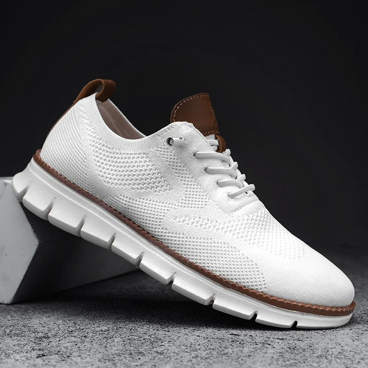 Bekväma herr sneakers för urban livsstil. Låga fritidsskor med modern stil för vardagsbruk.