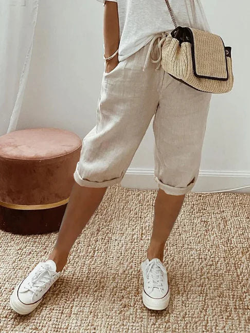 Casual byxor för dam, bomullsblandning, sidfickor, monokrom design, bekväma vardagsbyxor.