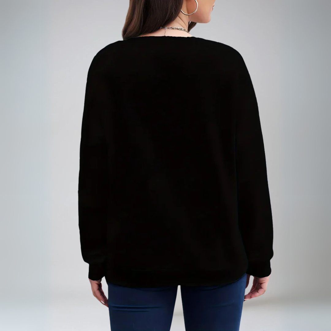 Stilren damtröja med hjärtmotiv. En avslappnad och bekväm pullover för kvinnomode.