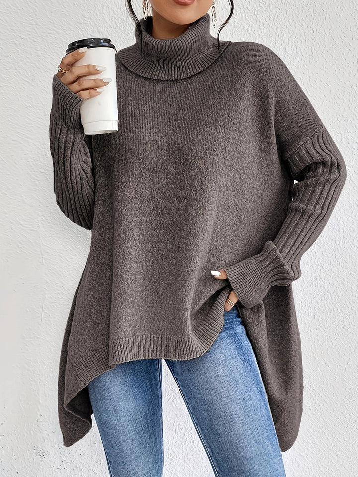 Modern damtröja med hög polokrage, idealisk för kalla dagar. Varm, skön & elegant vinterstil.