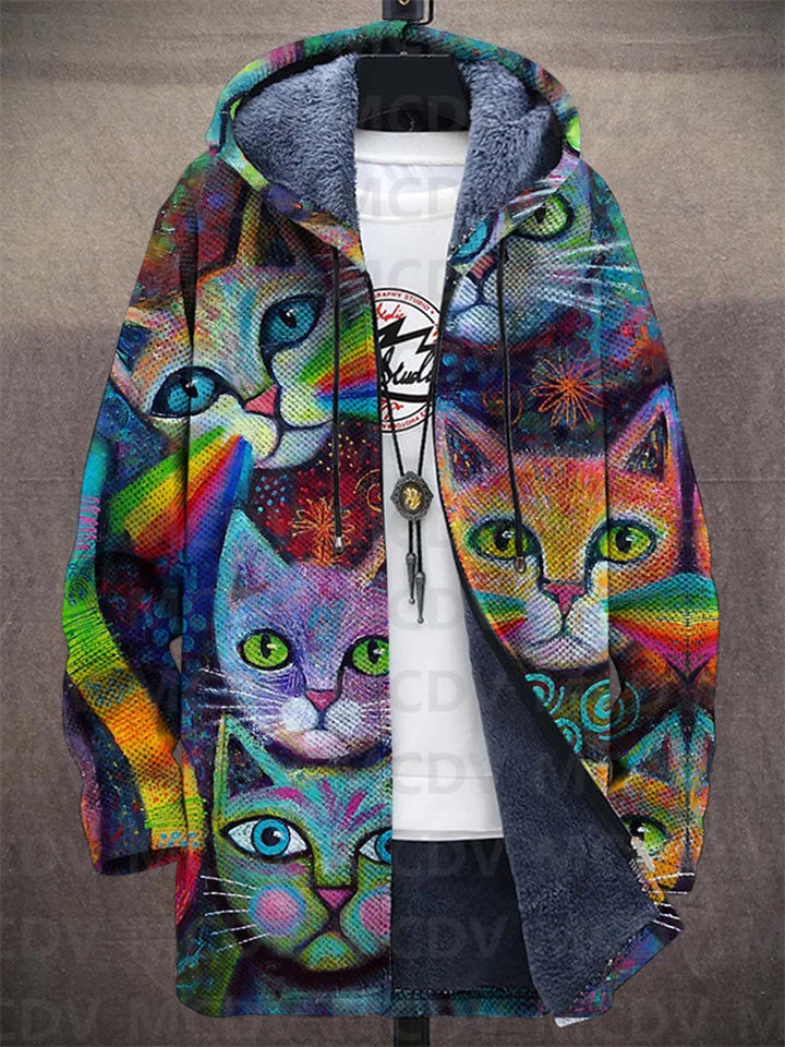 Lekfull damkappa i mysig fleece med sött kattmönster. Bekväm och varm med lös passform för en stilren vardag.