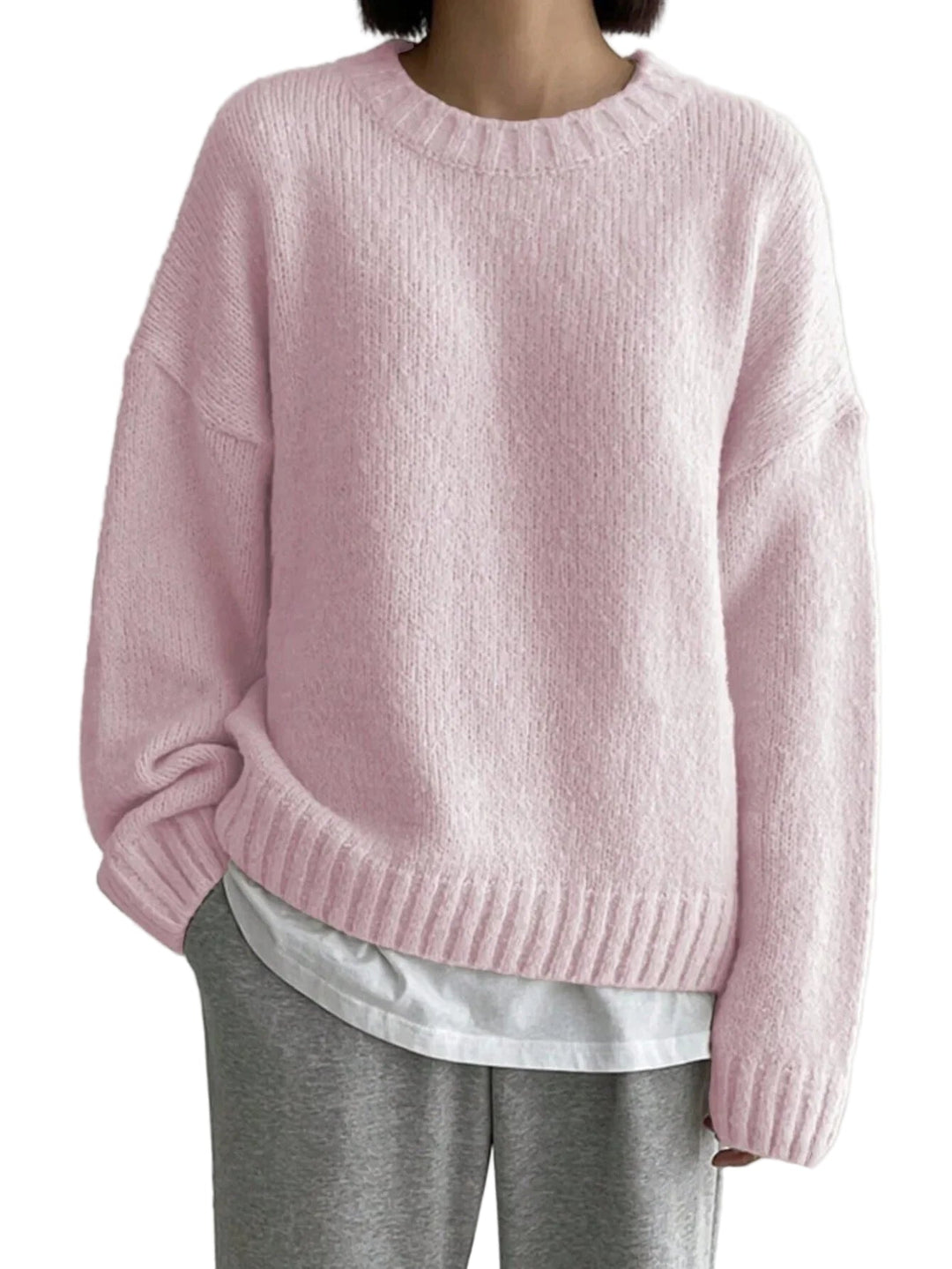 Mysig oversize damtröja i stickad design med rund hals. Perfekt för bekväm, avslappnad höst- och vinterstil.