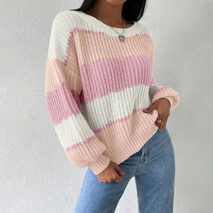 Elegant & stilren oversized dam pullover tröja. Bekväm rundhalsad modell för mode under kallare dagar.
