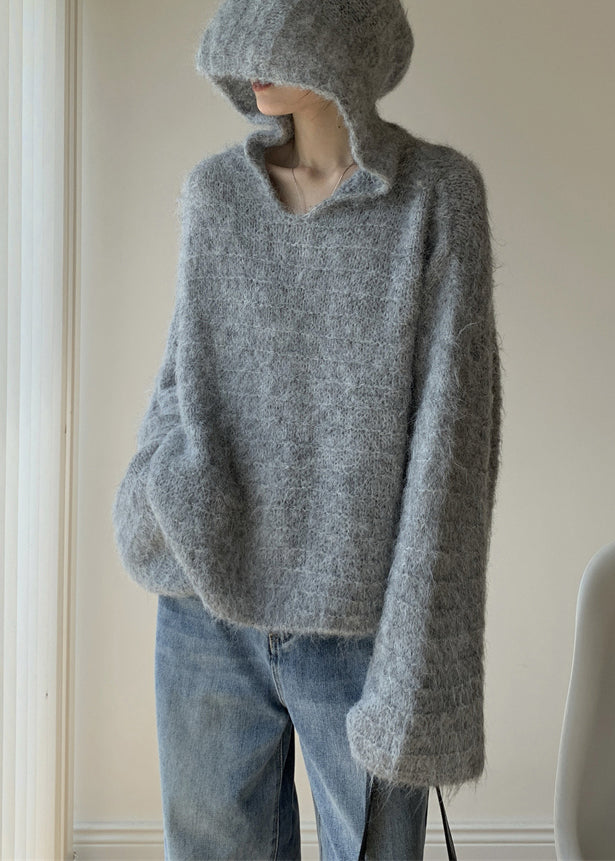 Elegant stickad huvtröja för kvinnor, en mysig och avslappnad modefavorit för vår- och höstkollektionen.