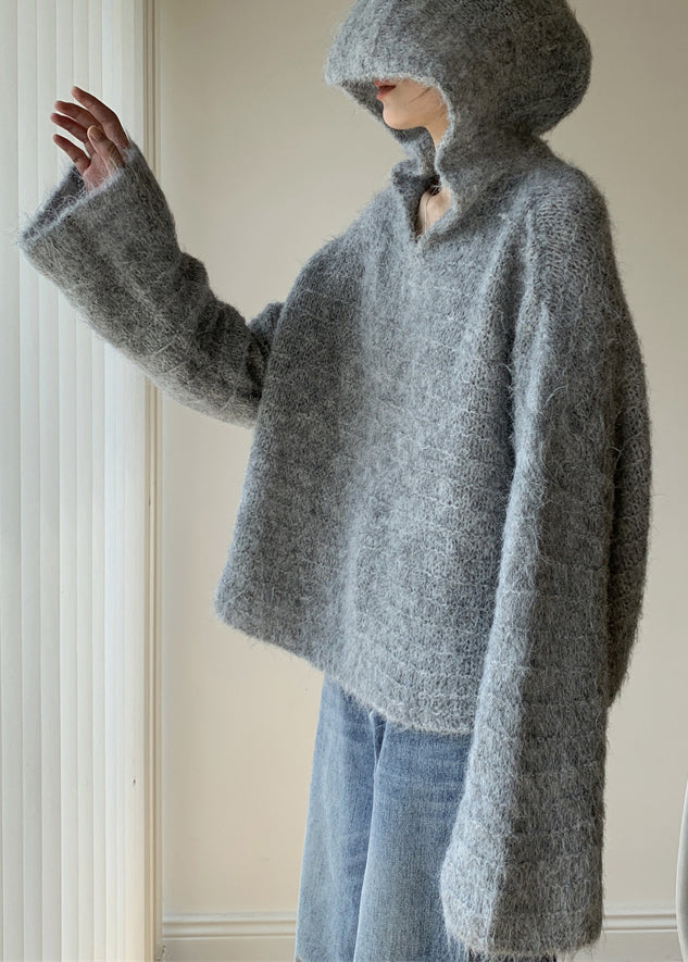 Bekväm stickad huvtröja med lös passform för kvinnor, mångsidig för vardag och avslappnade tillfällen.