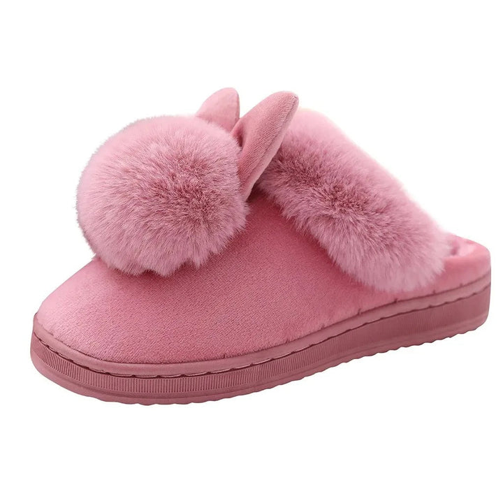 Mysiga fluffiga kanintofflor för kvinnor med söt design, perfekta för hemmakomfort.