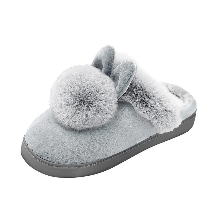 Fluffiga inomhusskor för kvinnor, kanintofflor med halkfri sula för trygg hemmakomfort.