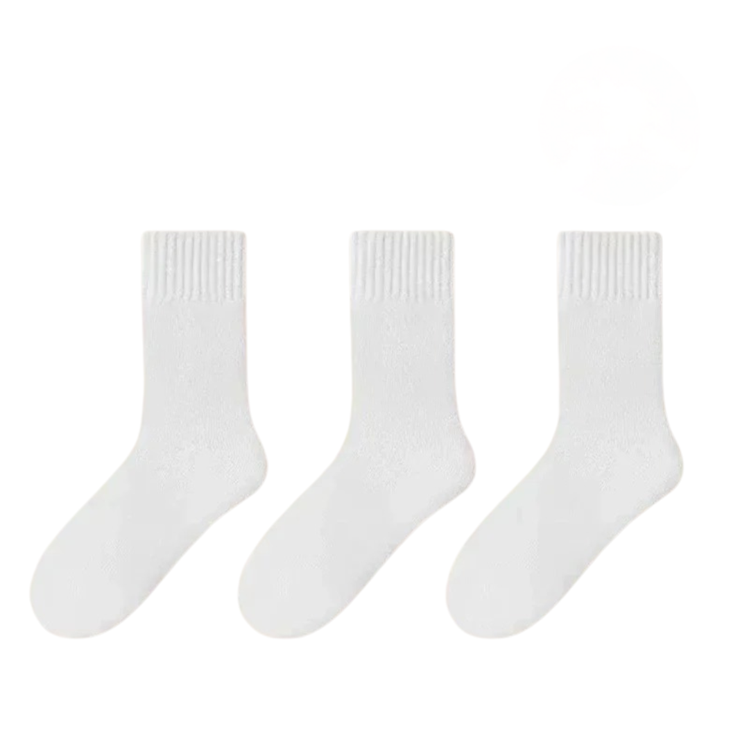 Mysiga, varma damstrumpor i 3-pack för vintern. Perfekta svarta, vita och gula vinterstrumpor för kvinnor.