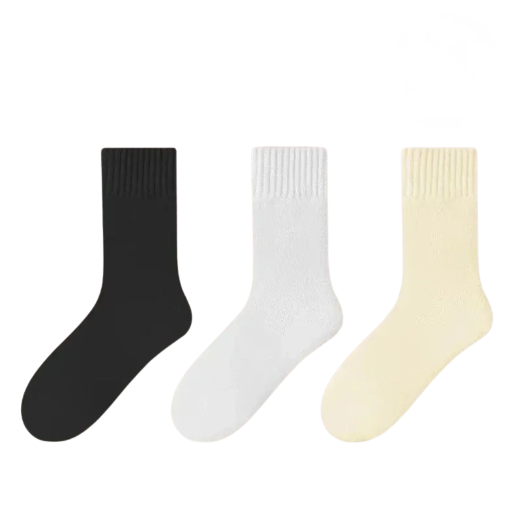 Vikta, varma damvinterstrumpor i svart, vitt och gult. Ett prisvärt 3-pack mysiga strumpor.