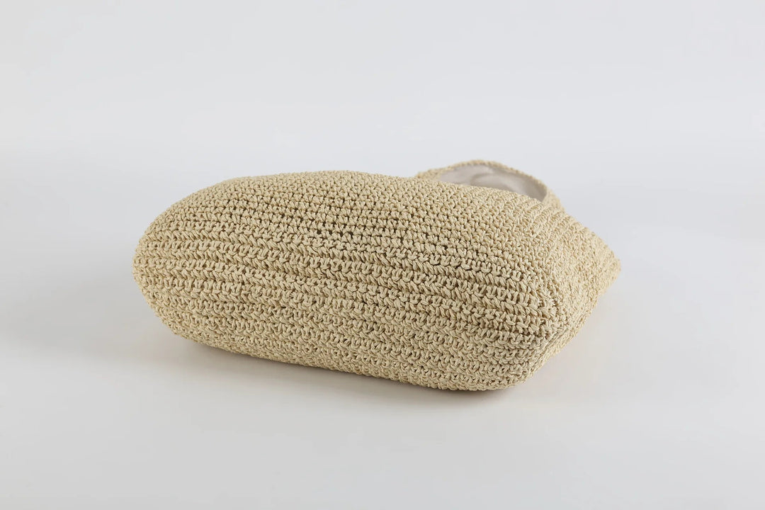 Lätt och rymlig solkysst strandväska, beige toteväska för sommarens äventyr.