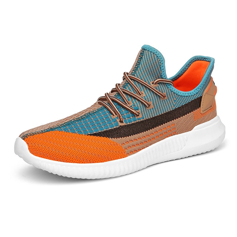 Orange lätta damsneakers, luftiga fritidsskor för aktiv vardag.