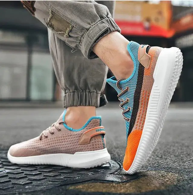 Luftiga orange fritidsskor, perfekta bekväma sneakers för dam.