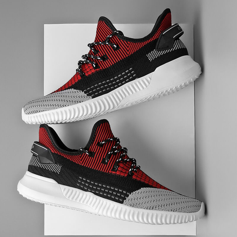 Sportiga orange damsneakers med luftig design för vardagsbruk.