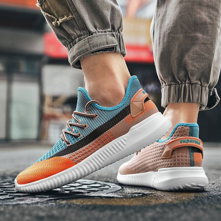Orange sneakers för dam, lätta och sportiga vardagsskor.