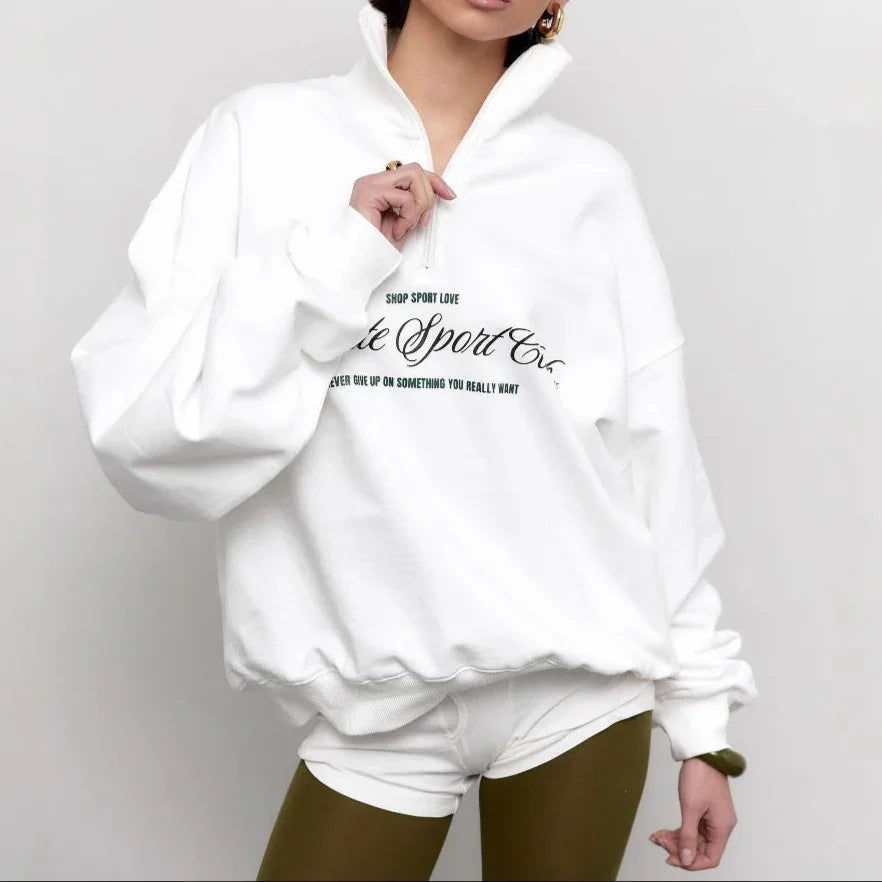 Damtröja oversized med halv dragkedja, unikt bokstavstryck. Perfekt sweatshirt för avslappnad & trendig stil.