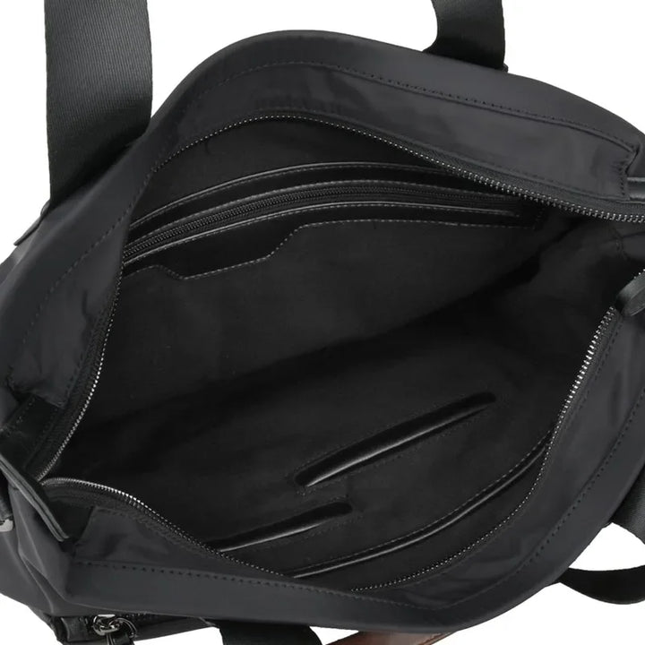 Säker OxfordCarry laptopväska, unisex modell. Mångsidig datorväska som tål pendling och organiserar effektivt.