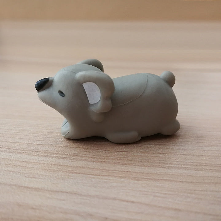 Gris djurkabelskydd för USB-laddare, dekorativt skydd som bevarar kabelns kvalitet.