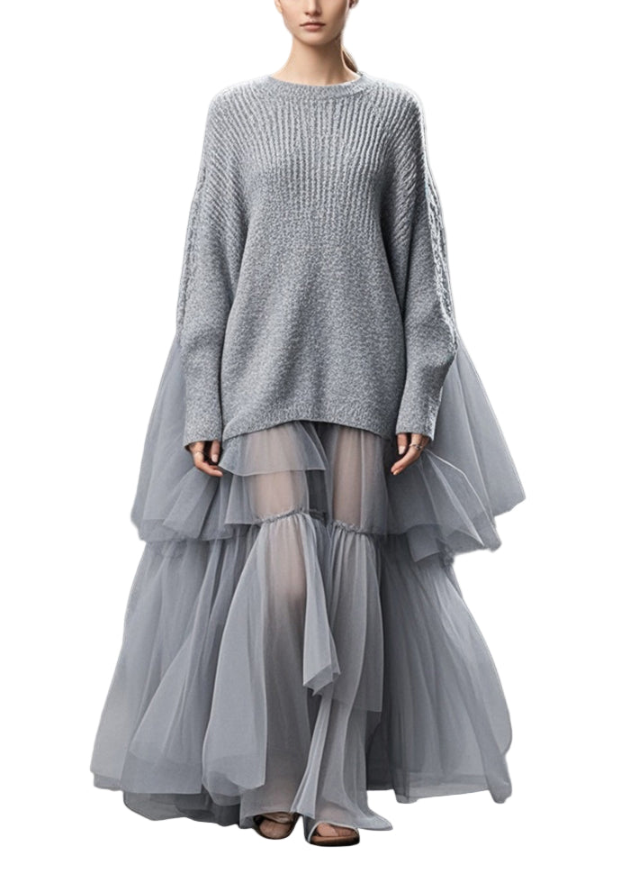 Plus size damklänning med trendig oversized passform och unikt grått patchworkmönster. Perfekt höstklänning.