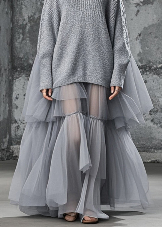Grå plus size höstklänning med oversized passform och unikt patchwork. Bekväm och stilren för kvinnors mode.