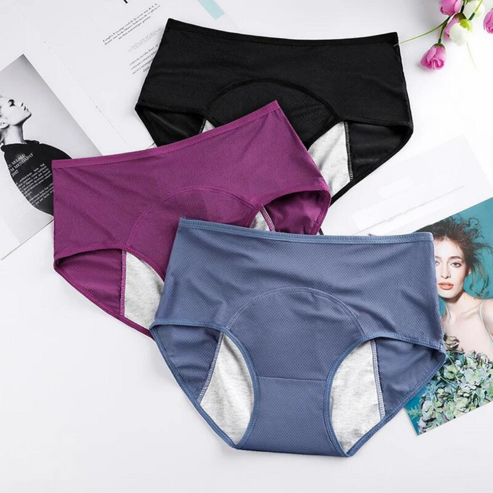 Kvinnors plus size periodtrosor, hög midja, visad bakifrån. Bekväma, läckagesäkra underkläder för mensskydd.