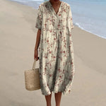 Grön med rosa blommor