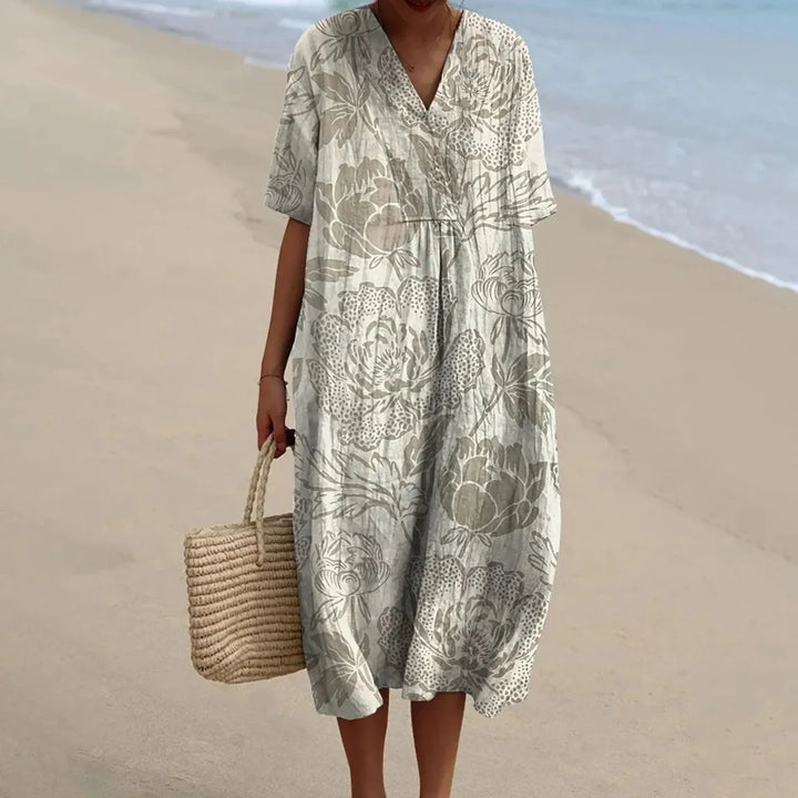 Sommarklar plus size skjortklänning, blommig design, kort ärm, med sidofickor.