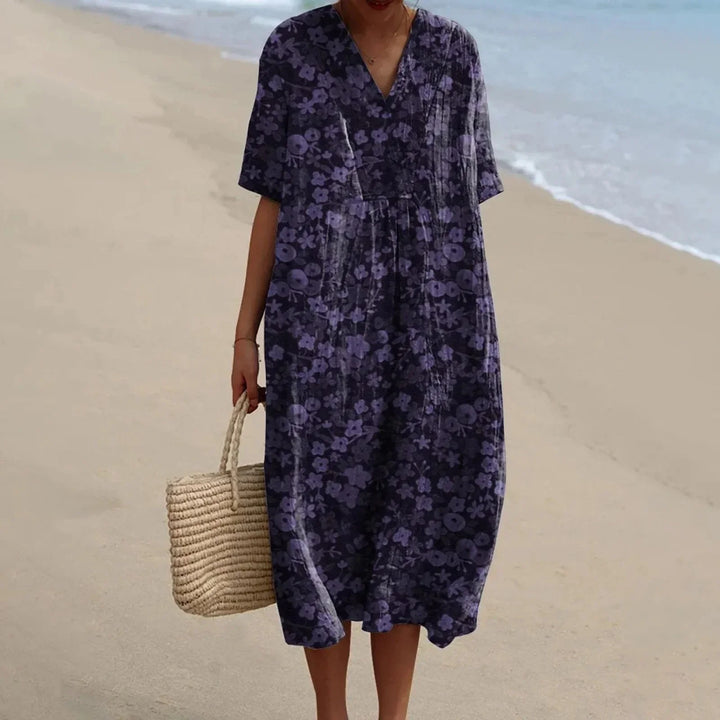 Snygg plus size skjortklänning, blommigt, kort ärm, perfekt för en avslappnad sommarlook.