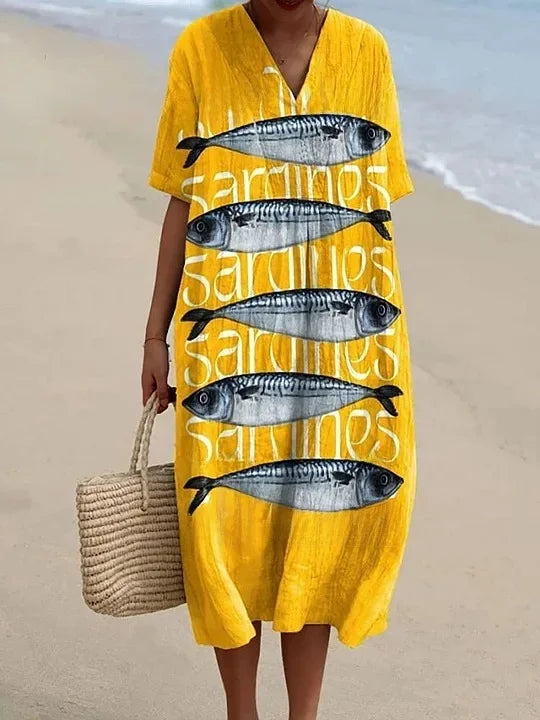 Bekväm plus size damklänning, kortärmad med fickor. Sommarklänning i luftigt mönster.