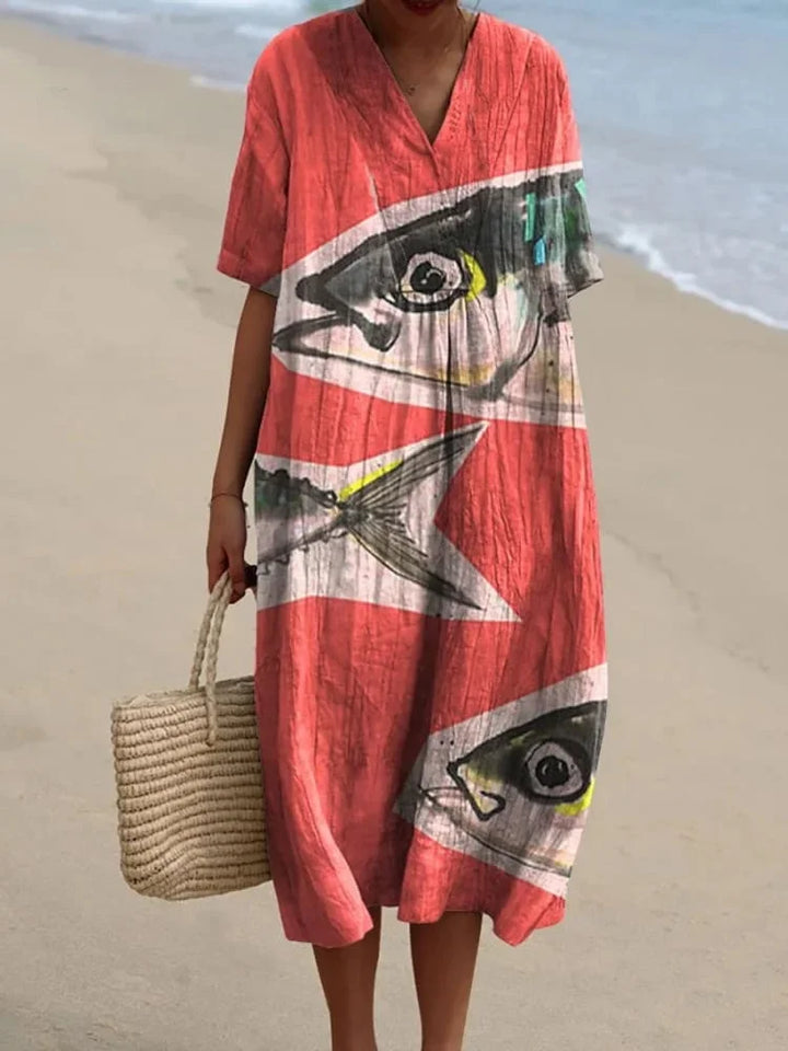 Marint mönstrad kortärmad plus size klänning med fickor. Perfekt sommarplagg för kvinnor.