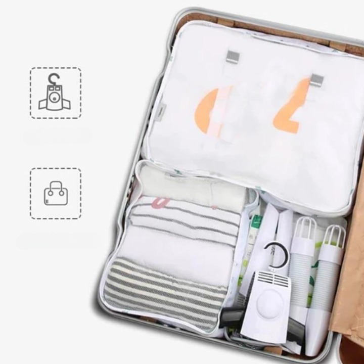 Smart gadget: elektrisk klädtorkhängare monterad, idealisk för torkning av ömtåliga plagg.