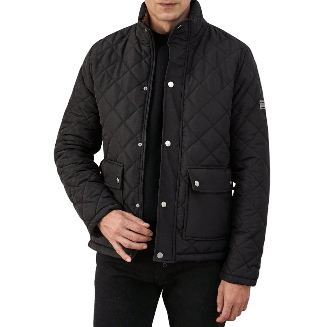 Quiltad herrjacka med stativkrage i modern stil, perfekt som varm höst- eller vinterjacka för män.