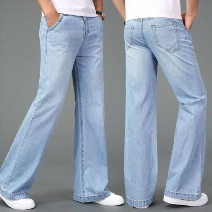 Snygga bootcut herrjeans för män, kombinerar retrostil med modern vardagsstil.